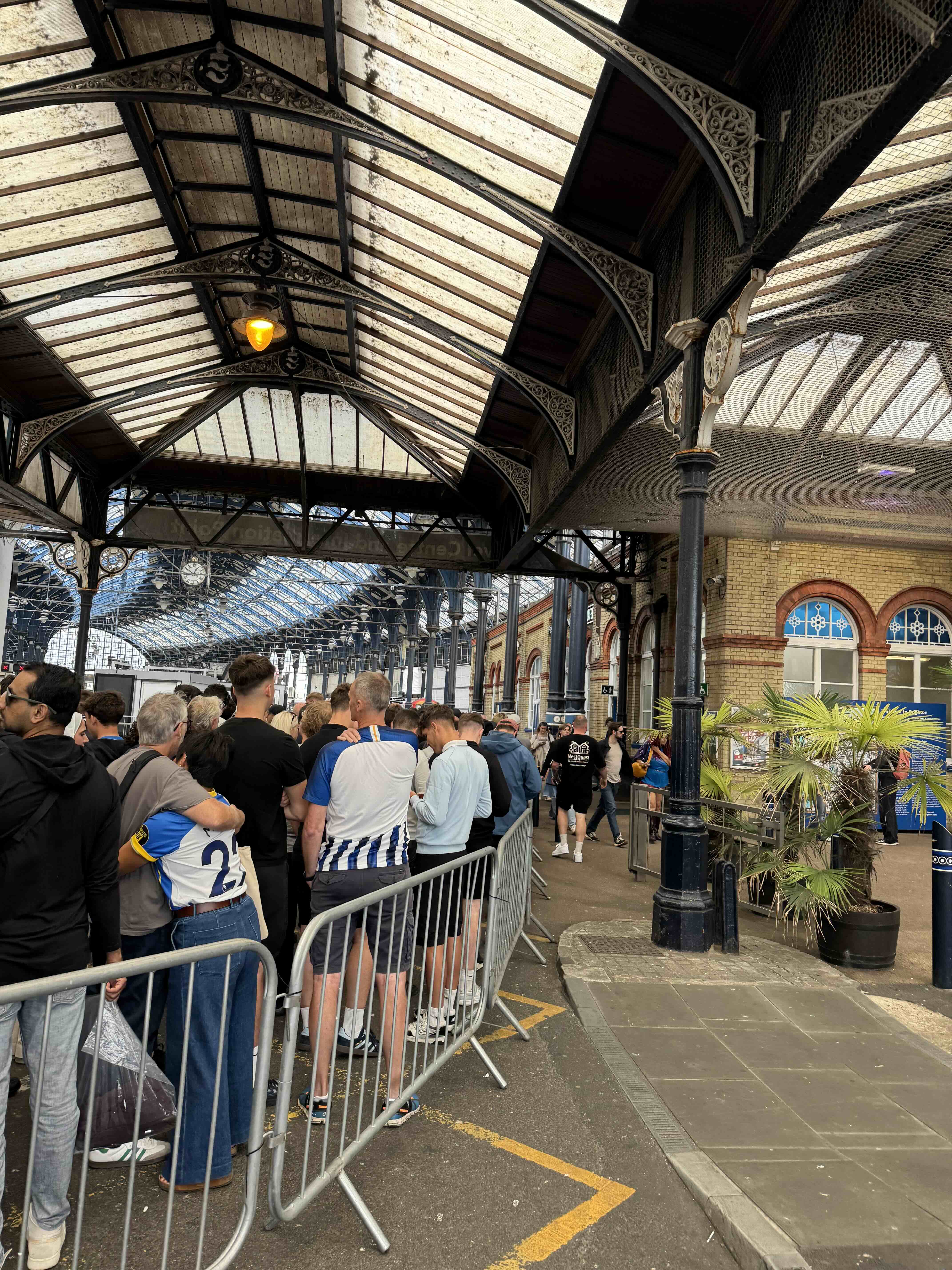 Brighton Fans queueing for the train to the Amex Stadium