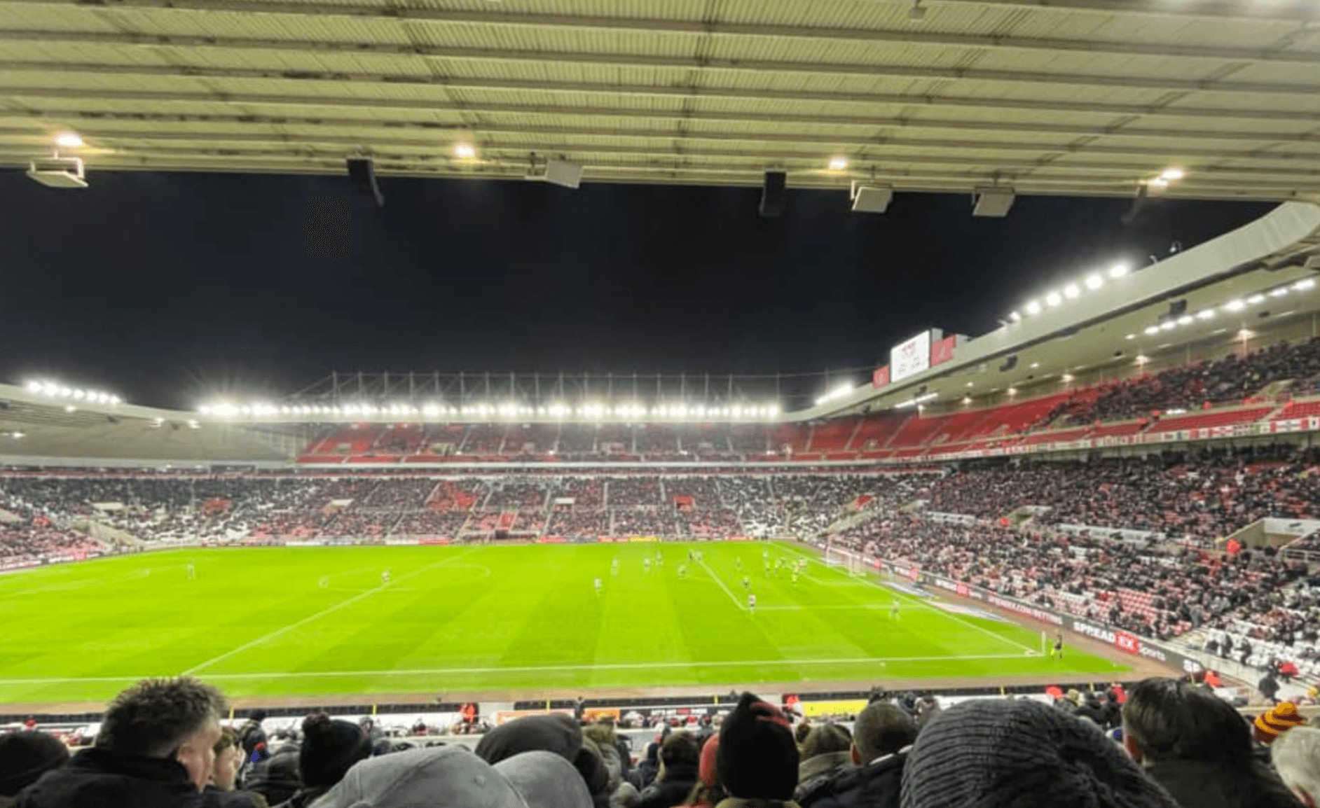 A full house at the Stadium of Light on a floodlit matchday evening in the Premier League.