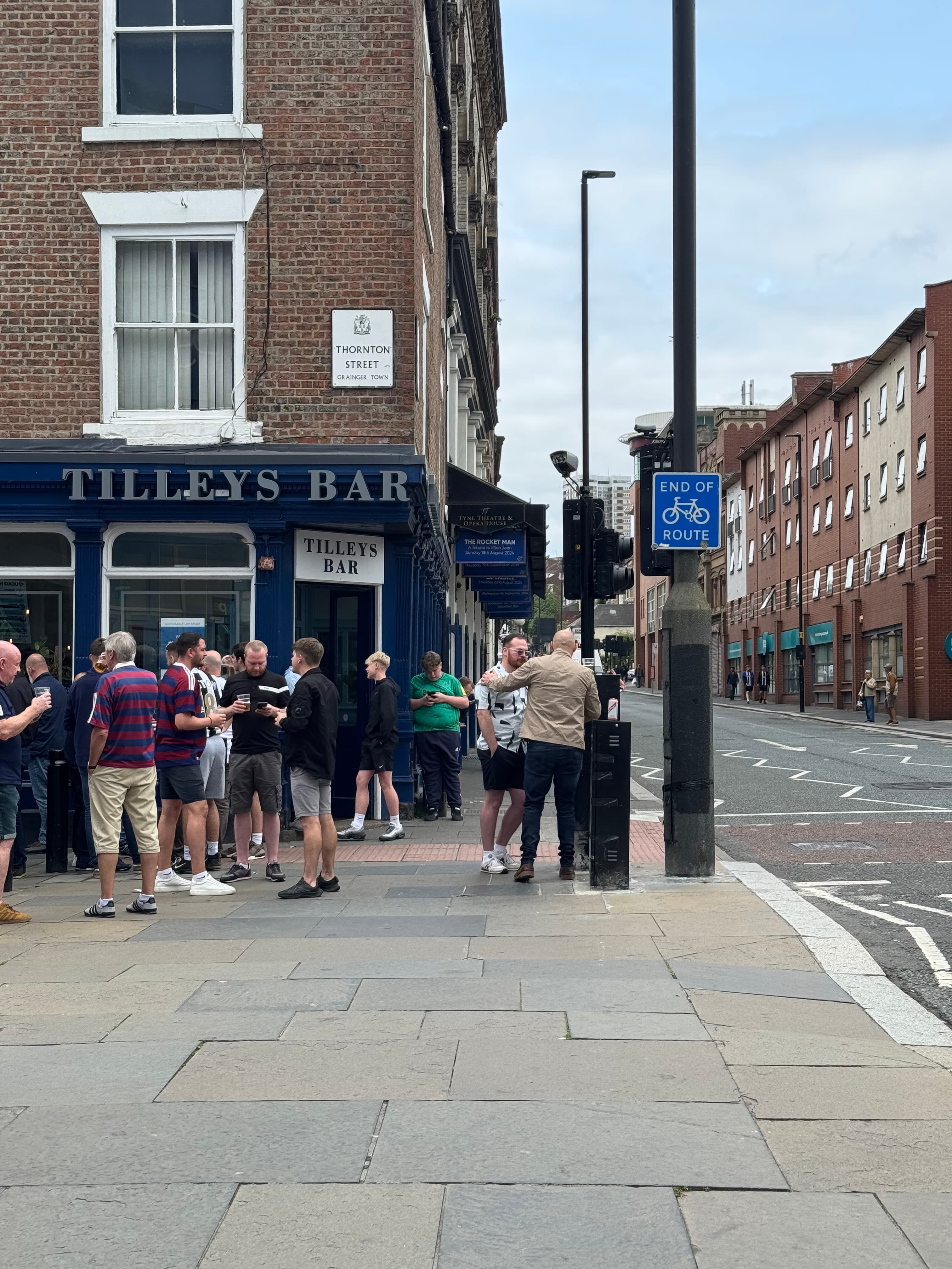 Football fans outside Tilleys Bar in Newcastle before a match